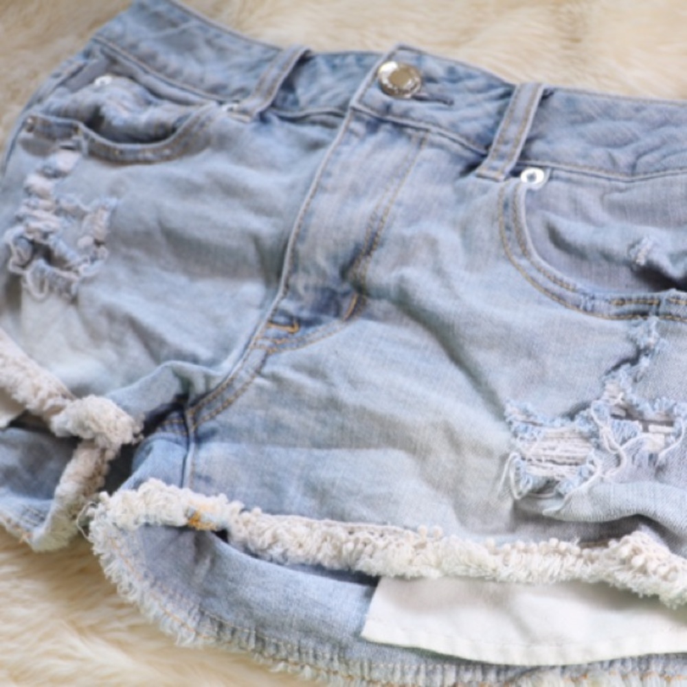 American eagle jean shorts with fringe